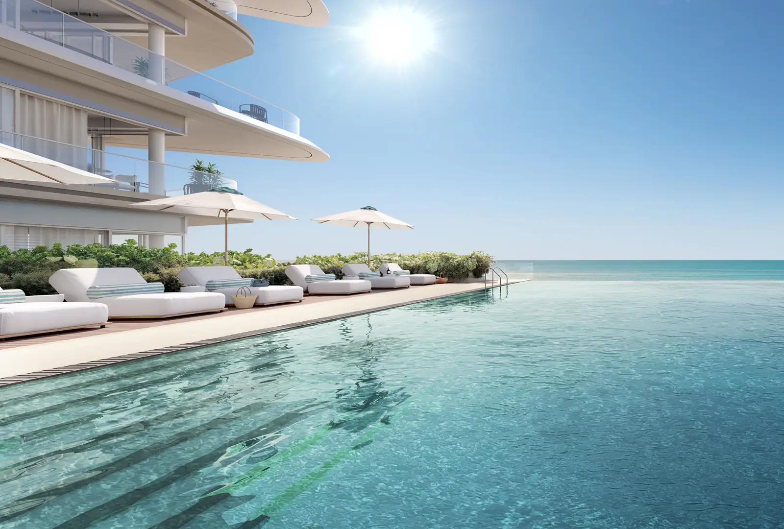 Fahid Beach Residences: Pool mit Liegen am Meer
